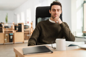 Entrepreneur working with a laptop and documents